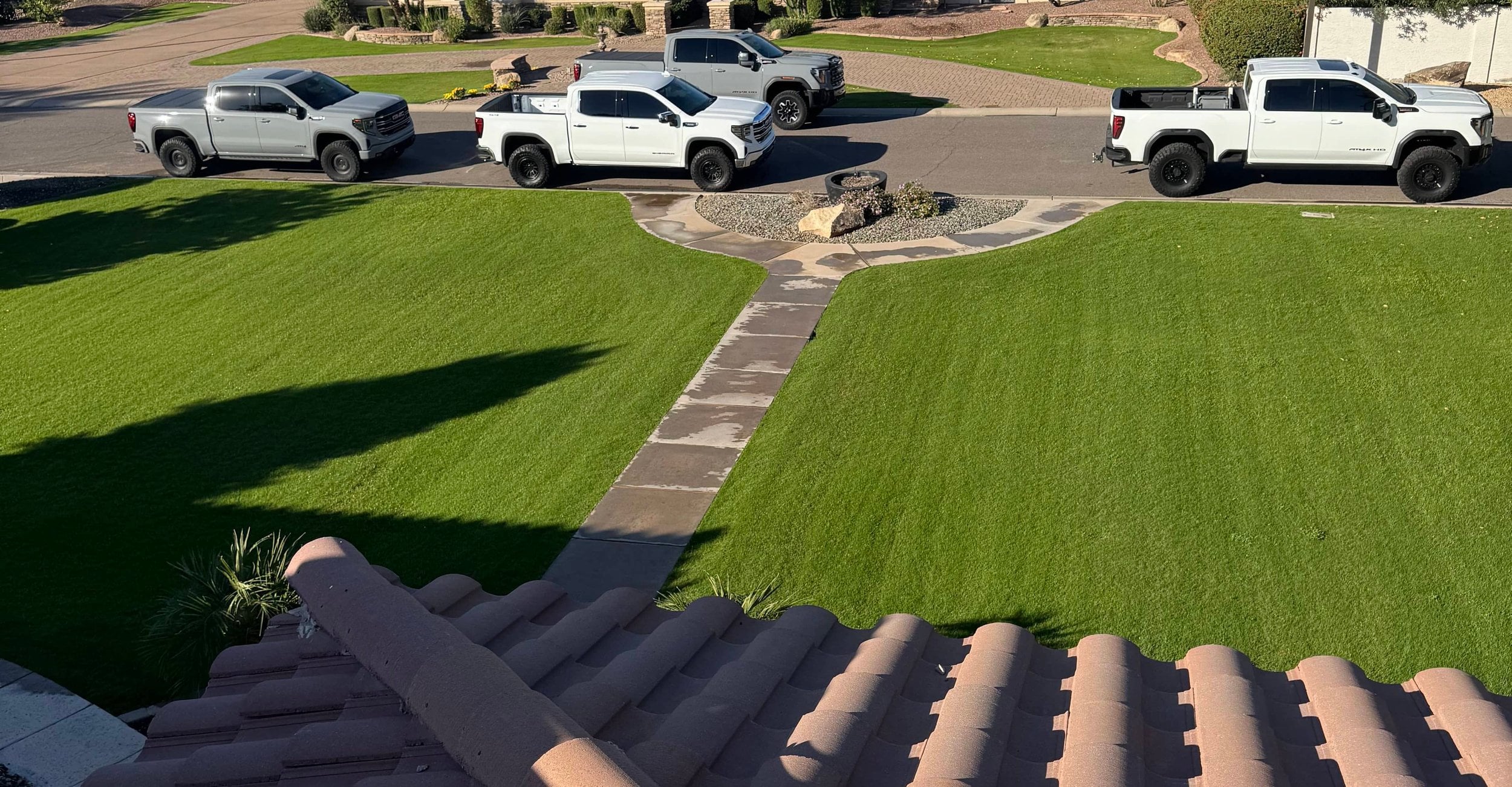 Aerial view of an Arizona residential neighborhood with a mountain backdrop